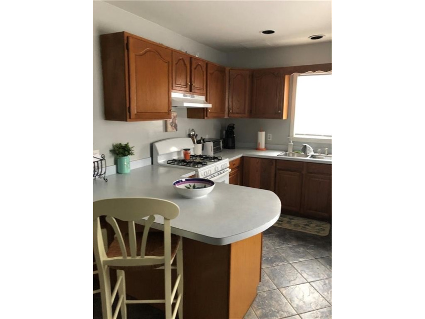 Welcome to this well-maintained 3 family home + 2 car garage - photo 7