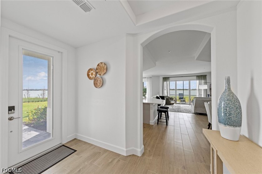 Absolutely stunning coach home on a peninsula lot with expansive - photo 7