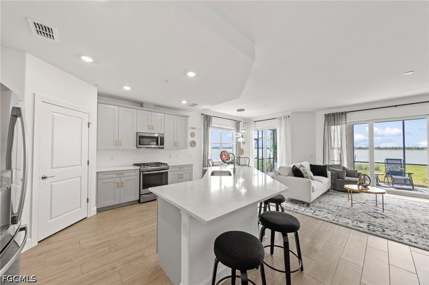 Absolutely stunning coach home on a peninsula lot with expansive - photo 8