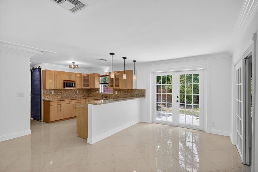 Located in the desirable Wilton Manors neighborhood, this home - photo 6