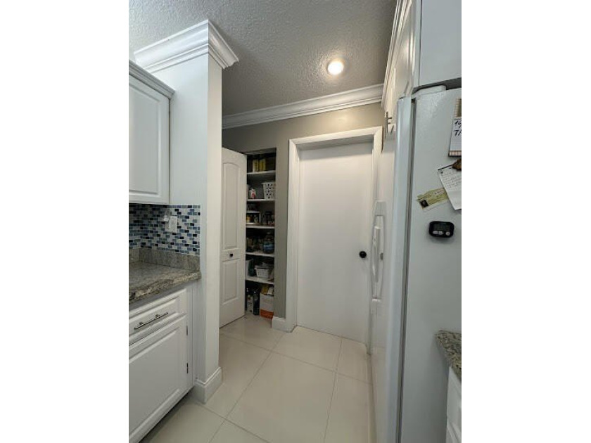 Beautiful 2-bedroom, 2.5-bath townhouse featuring a kitchen with - photo 12