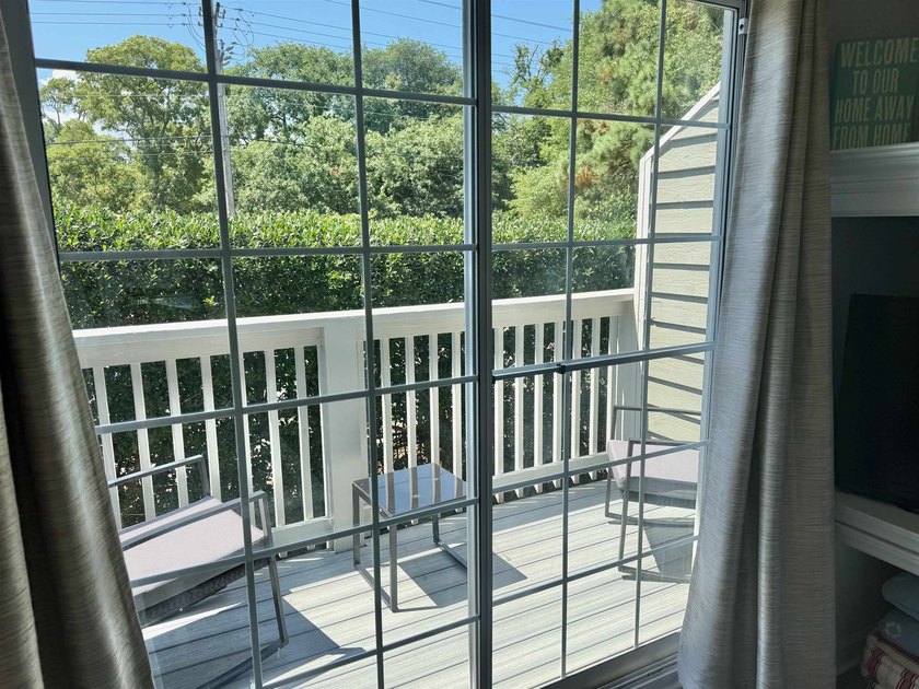 Updated townhome with new grey weathered-looking LVP flooring - photo 5