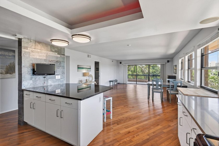 Rarely available 3rd-floor corner residence in the most sought - photo 11