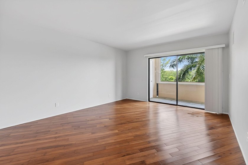 Rarely available 3rd-floor corner residence in the most sought - photo 12