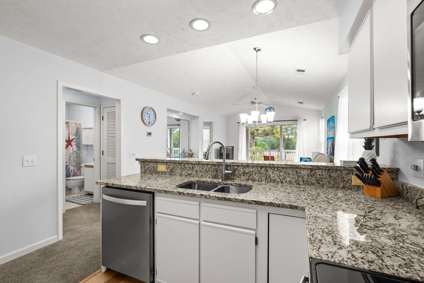 Welcome to Waterway Village! This beautifully updated - photo 9