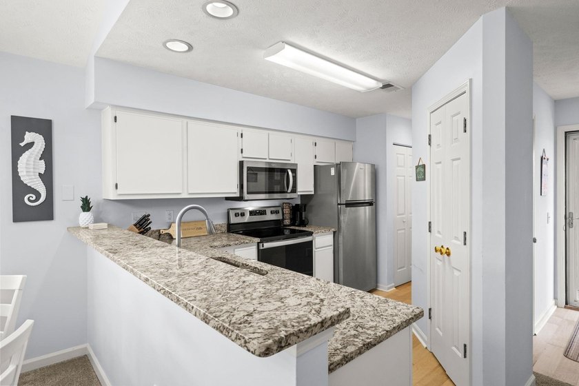 Welcome to Waterway Village! This beautifully updated - photo 10
