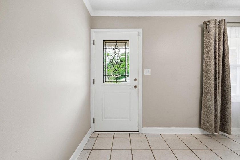 Welcome home to this beautifully updated 3-bedroom, 2-bath brick - photo 4