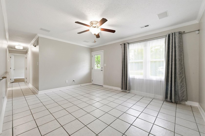 Welcome home to this beautifully updated 3-bedroom, 2-bath brick - photo 5