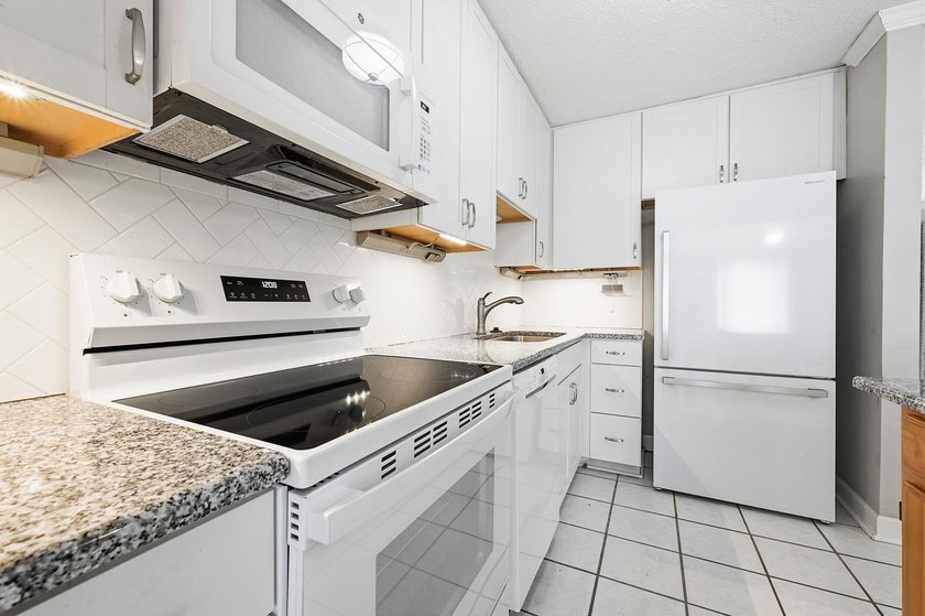 Welcome home to this beautifully updated 3-bedroom, 2-bath brick - photo 9