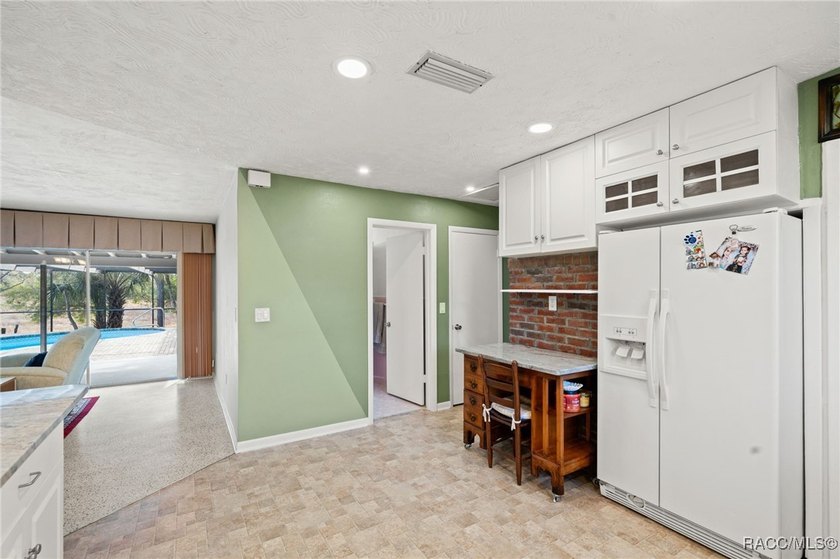 Move-in ready pool home featuring 3 bedrooms and 2 baths with a - photo 11