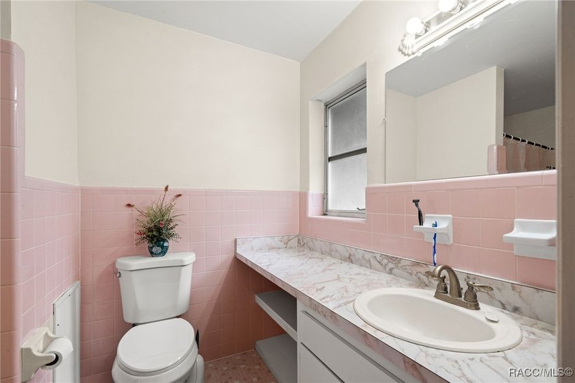 Move-in ready pool home featuring 3 bedrooms and 2 baths with a - photo 15