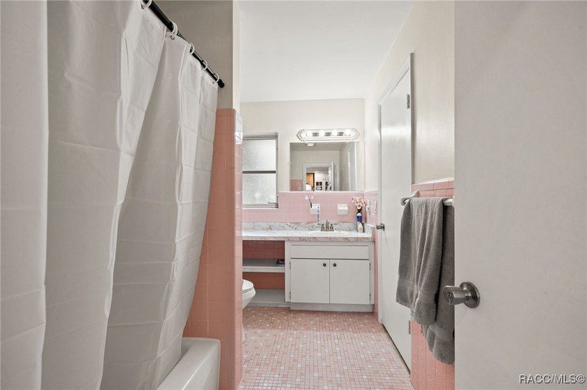 Move-in ready pool home featuring 3 bedrooms and 2 baths with a - photo 16