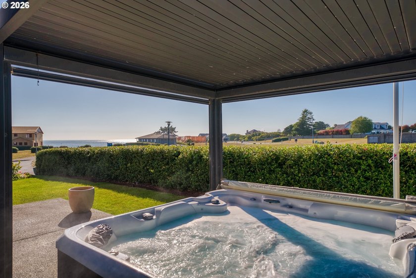 Coastal luxury meets comfort in this custom home within a - photo 38