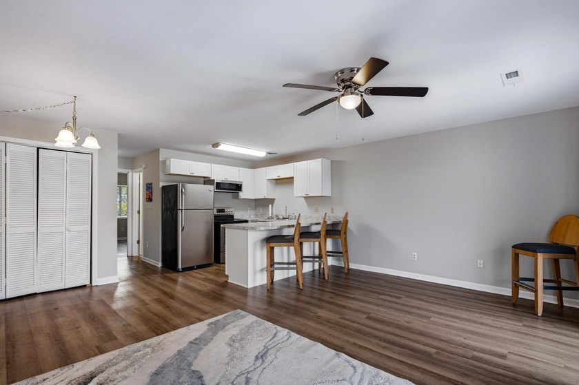 Enjoy comfortable coastal living in this bright and inviting - photo 4