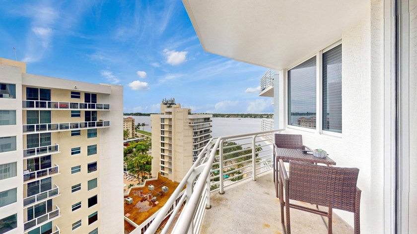 This 12th-floor unit in The Slade offers breathtaking views of - photo 3