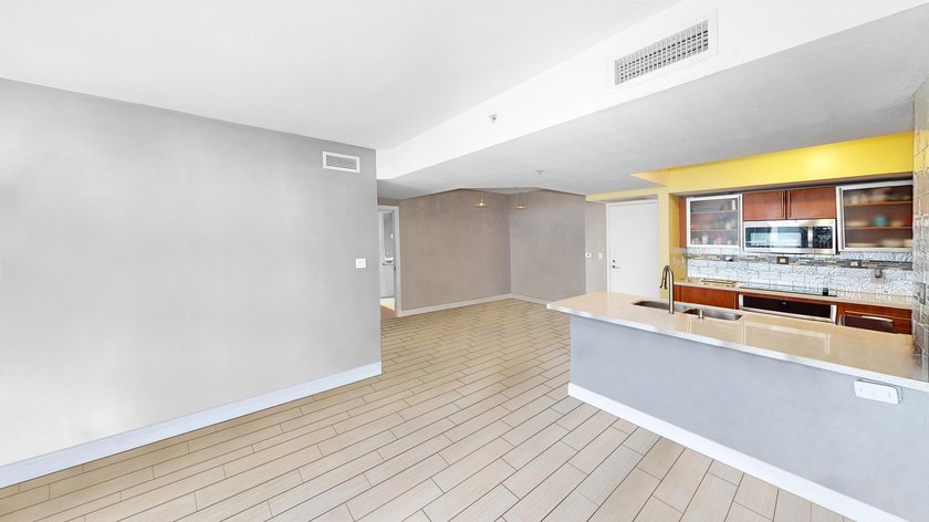 This 12th-floor unit in The Slade offers breathtaking views of - photo 5