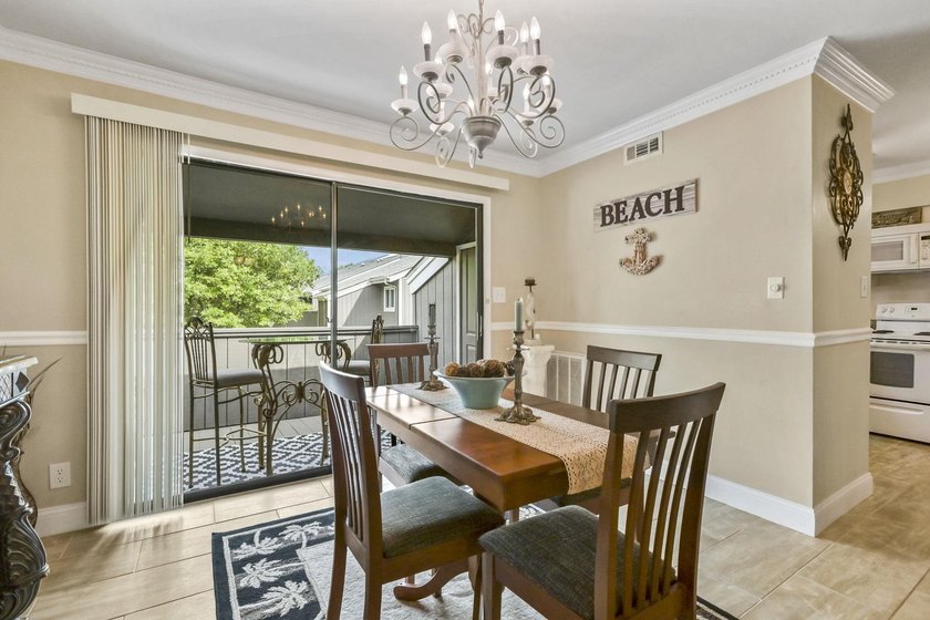 Experience easy coastal living in this beautifully updated - photo 6