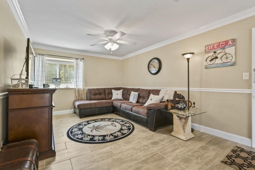 Experience easy coastal living in this beautifully updated - photo 7