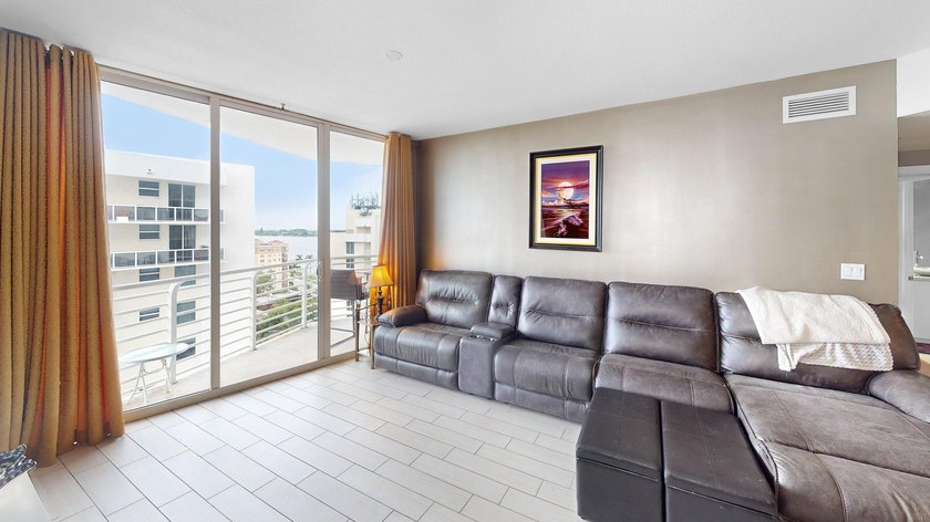 This 12th-floor unit in The Slade offers breathtaking views of - photo 7