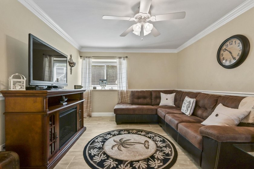 Experience easy coastal living in this beautifully updated - photo 8
