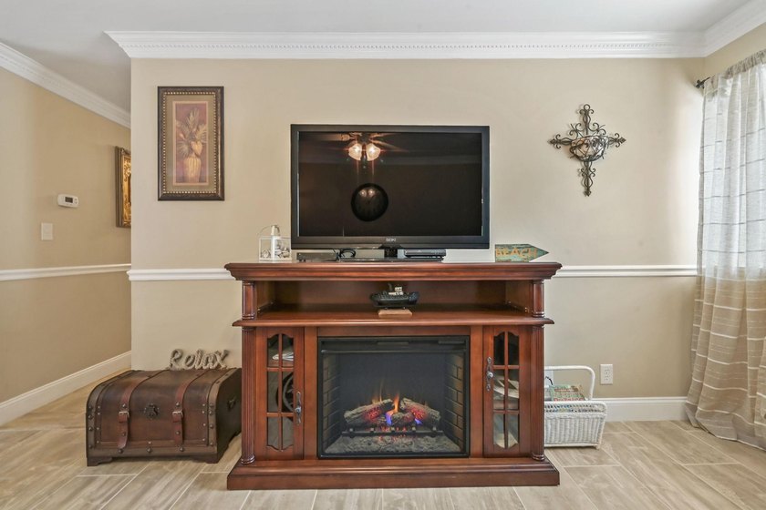 Experience easy coastal living in this beautifully updated - photo 9