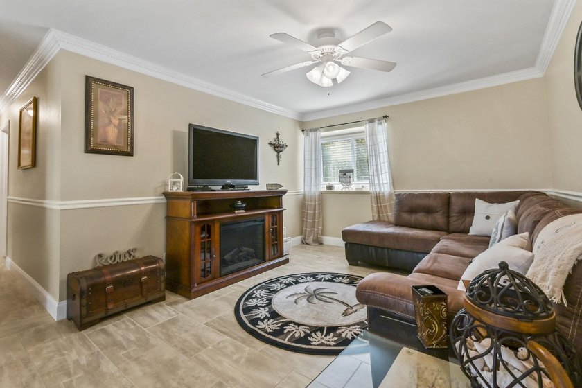 Experience easy coastal living in this beautifully updated - photo 10