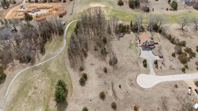 Perfectly positioned along the 14th fairway of the desirable - photo 12