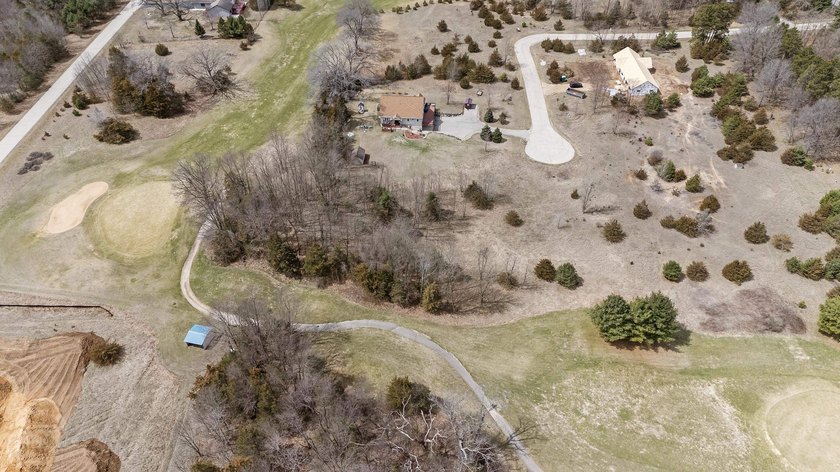 Perfectly positioned along the 14th fairway of the desirable - photo 14