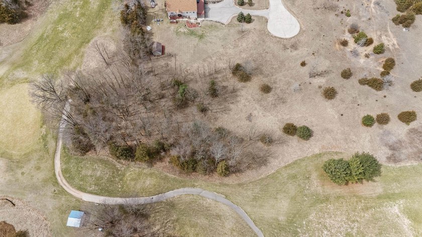 Perfectly positioned along the 14th fairway of the desirable - photo 16