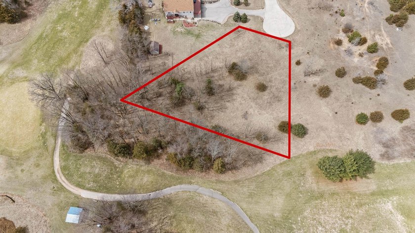 Perfectly positioned along the 14th fairway of the desirable - photo 17