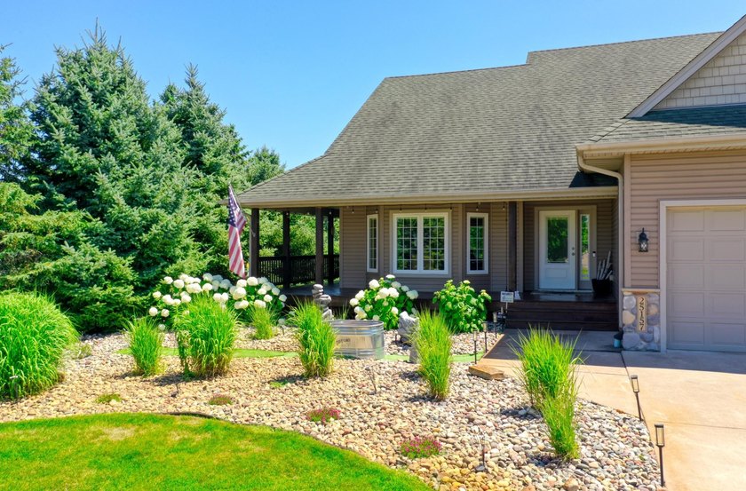 Experience the charm of front porch living in this meticulously - photo 18