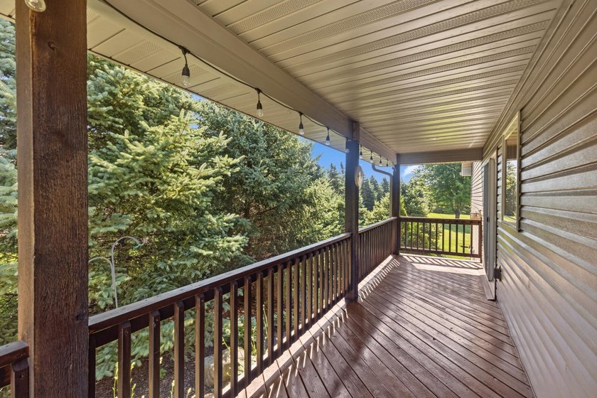 Experience the charm of front porch living in this meticulously - photo 20