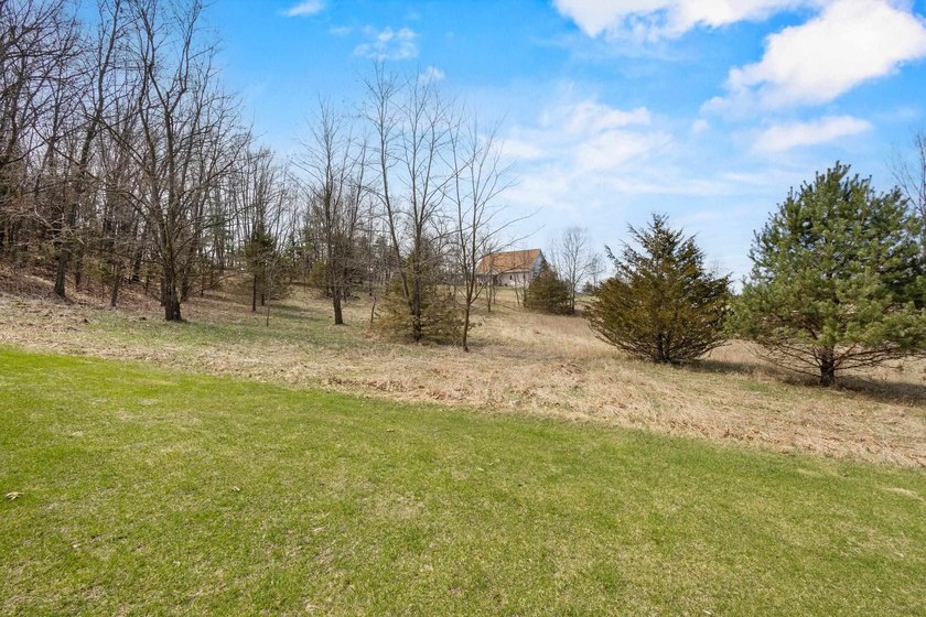Perfectly positioned along the 14th fairway of the desirable - photo 21