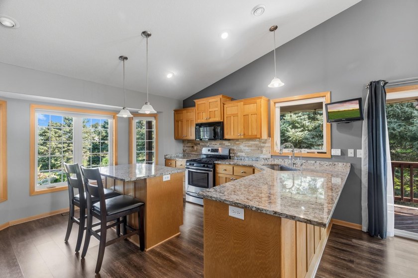 Experience the charm of front porch living in this meticulously - photo 26