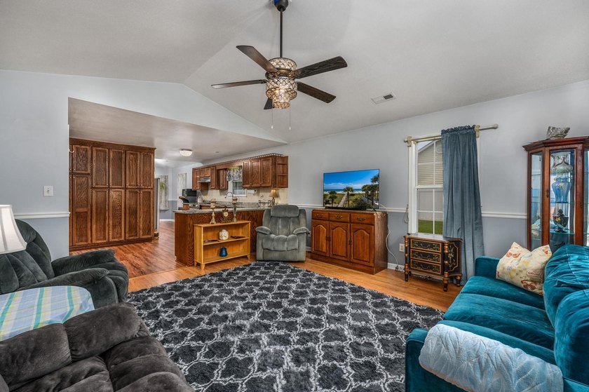 NO HOA, a fenced backyard overlooking the pond, and an updated - photo 7