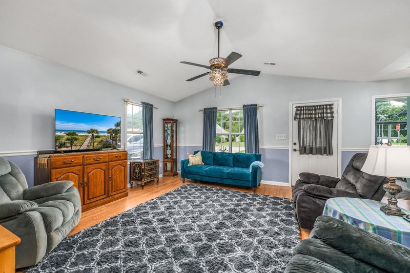 NO HOA, a fenced backyard overlooking the pond, and an updated - photo 8