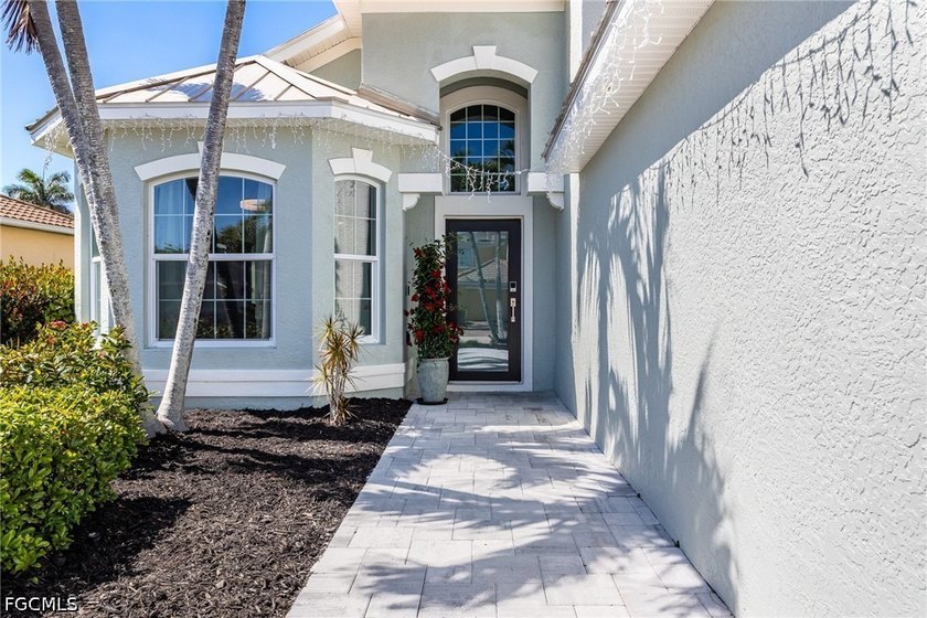 Better than new, this fully renovated 4-bedroom pool home - photo 3