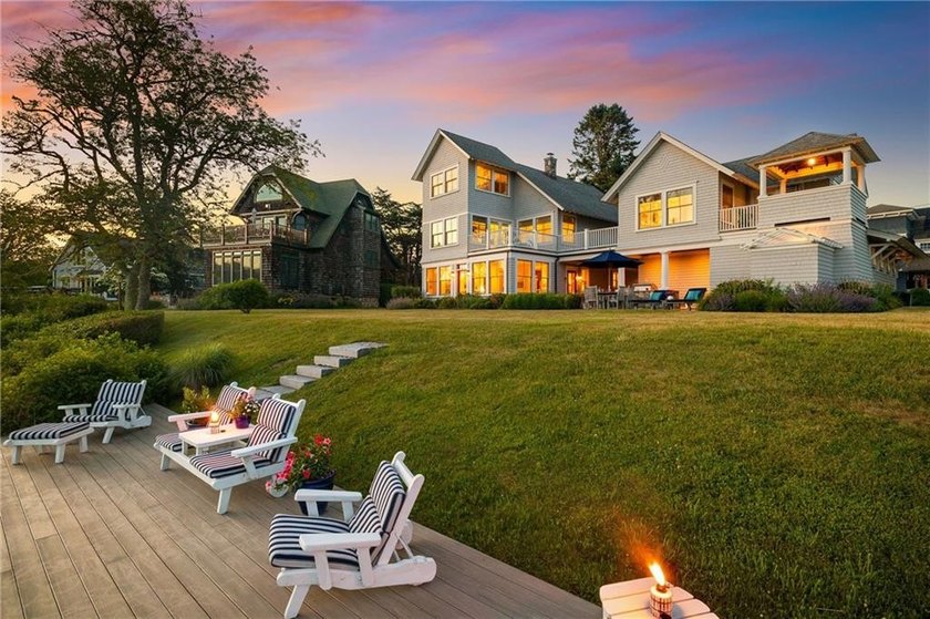 Perched at the water's edge, 19 Teal Drive is a custom-built - photo 5