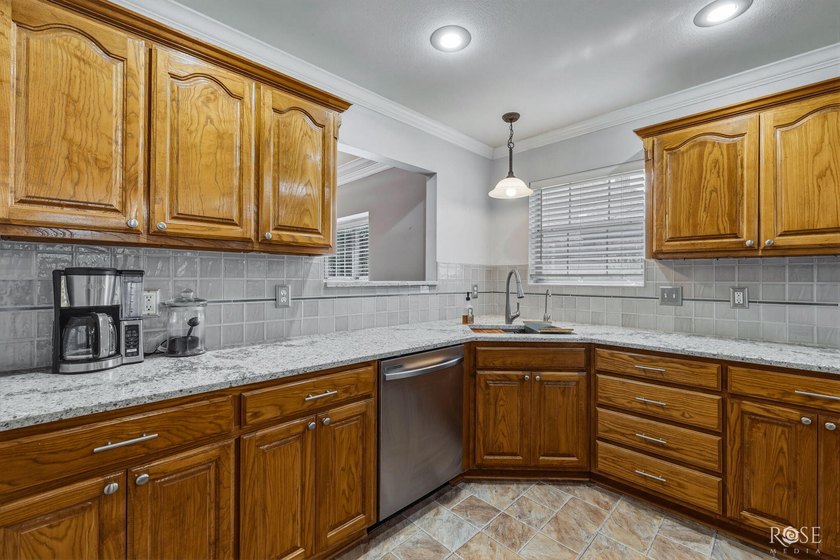 This beautiful, 4-bedroom brick home offers numerous updates and - photo 11