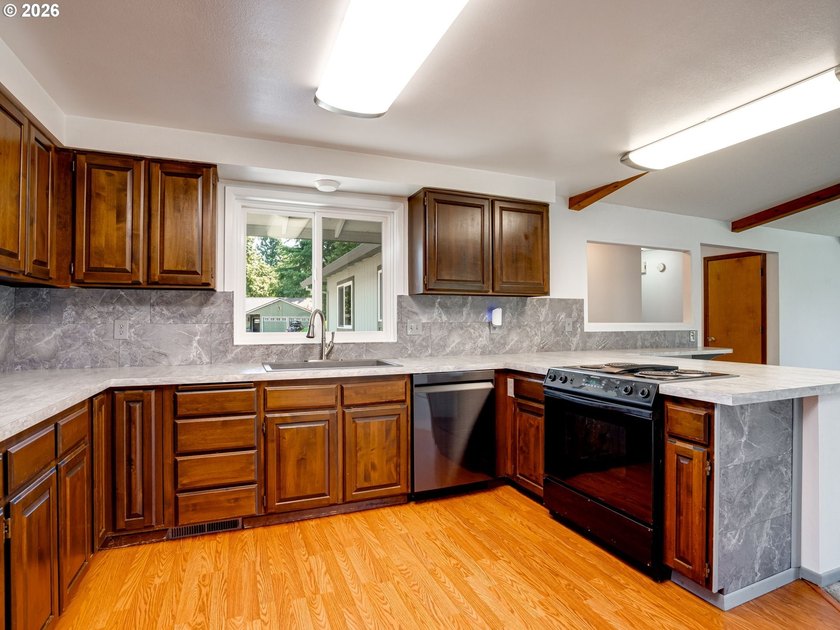 You won't want to miss this amazing one-level ranch tucked in a - photo 12