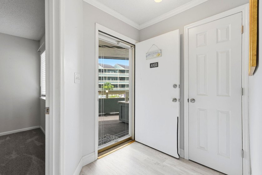 Welcome to Golf Glenn Villas! This inviting 2 bedroom, 2 bath - photo 6