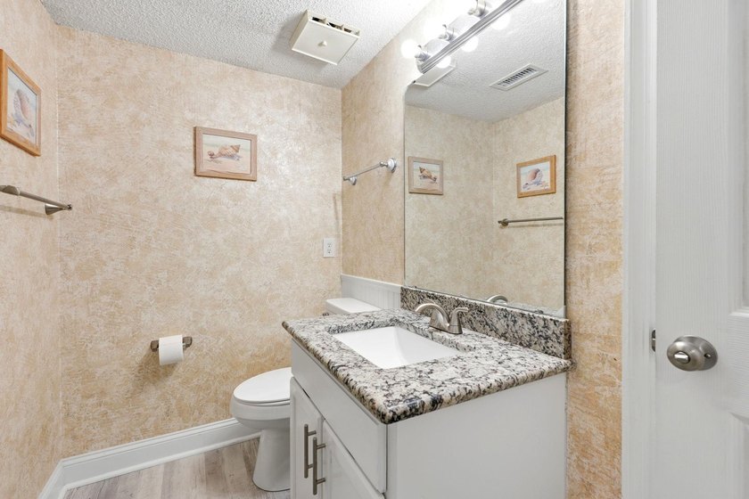 Welcome to Golf Glenn Villas! This inviting 2 bedroom, 2 bath - photo 9