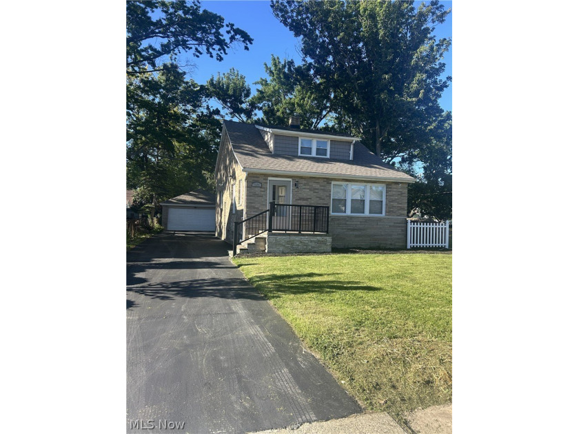 Like no other!!! This *Custom* Stunning brick Cape Cod 3 bedroom - photo 2