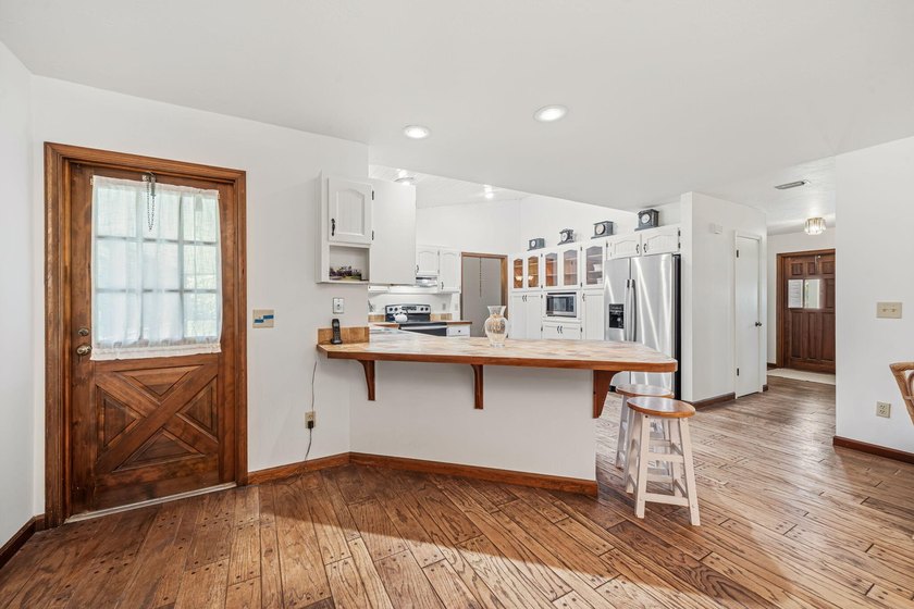Discover the charm and character of this custom-built cedar home - photo 13