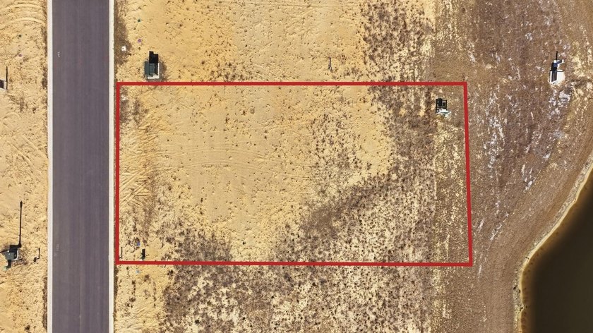 Cleared, and build-ready lot with Water Views located in the - photo 2