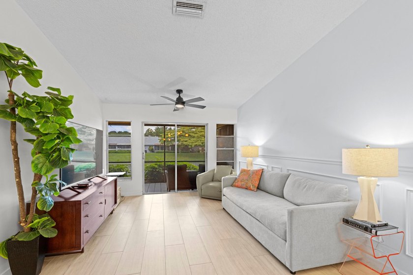 ABSOLUTELY GORGEOUS WATERFRONT VILLA | PRESTIGIOUS 55+ COMMUNITY - photo 4