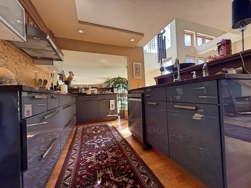 A Very Unique, Spacious Custom Designed Home Surrounded by - photo 13