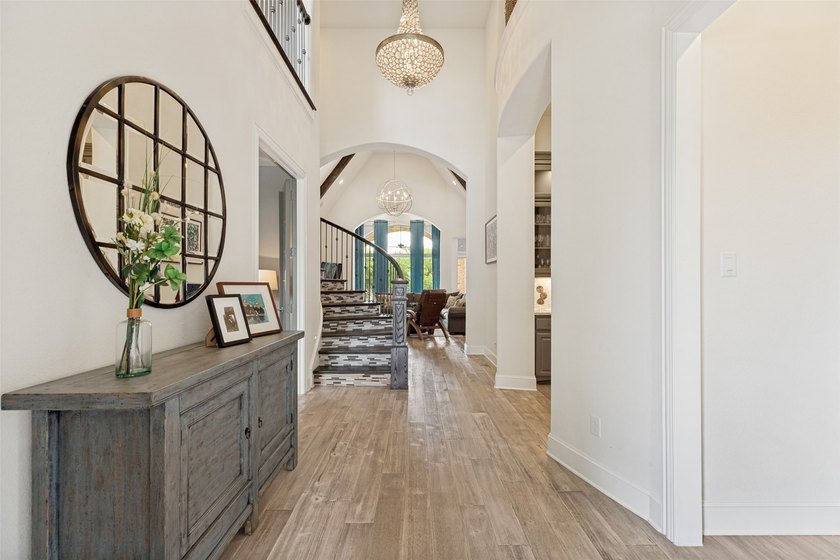 Lakeside luxury meets resort-style living in this exceptional - photo 3