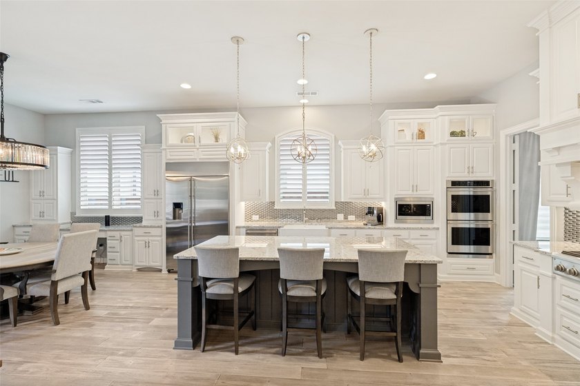 Lakeside luxury meets resort-style living in this exceptional - photo 9