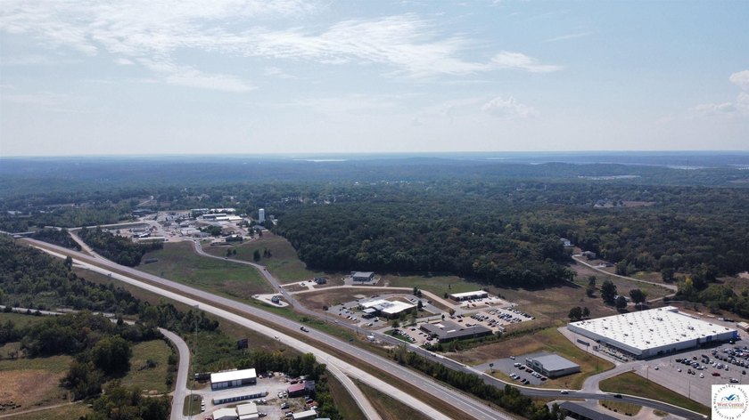 Commercial building and large tract located at the corner of 65 - photo 12